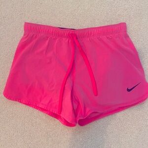 Hot pink Nike shorts